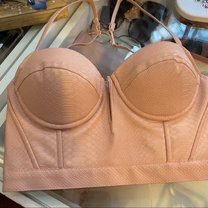 Crop bustier in pink crocodile pleather material